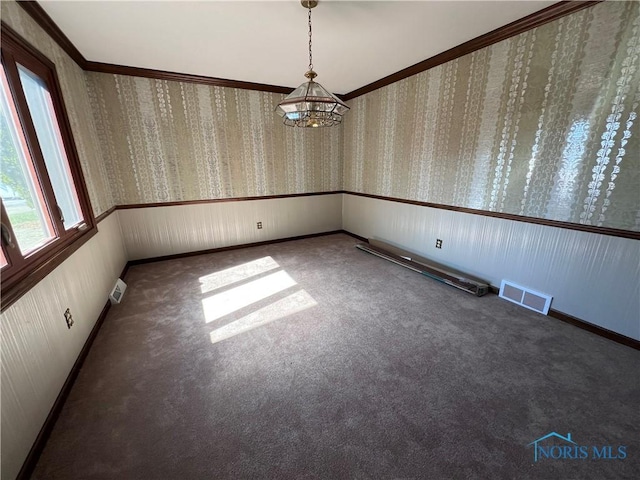 empty room with a notable chandelier, carpet floors, visible vents, baseboards, and wallpapered walls