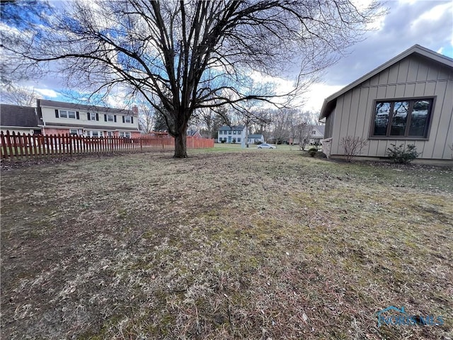 view of yard featuring fence