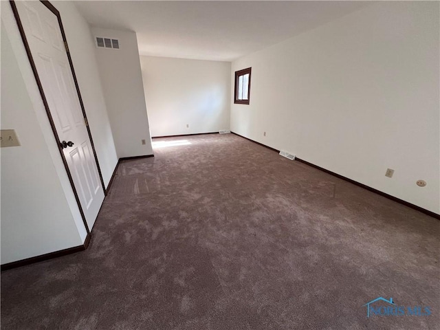 unfurnished bedroom featuring baseboards and visible vents