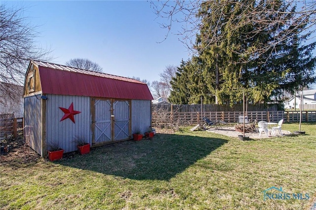 900 E Water St, North Baltimore, OH 45872 - view of shed with a fenced backyard