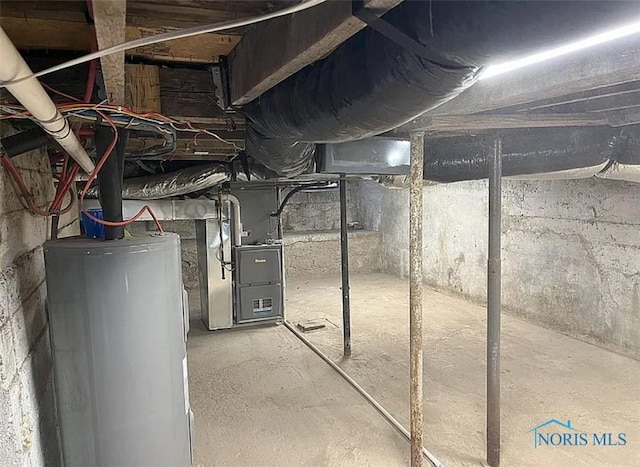 6888 County Road P50, Montpelier, OH 43543 - basement with heating unit and gas water heater