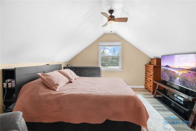 3063 Schneider Rd, Toledo, OH 43614 - bedroom featuring baseboards, lofted ceiling, ceiling fan, and light wood-type flooring