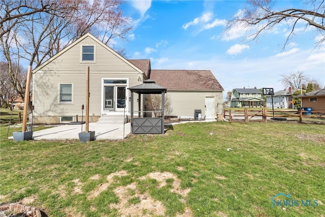 3063 Schneider Rd, Toledo, OH 43614 - rear view of property featuring fence, a patio, entry steps, a gazebo, and a yard