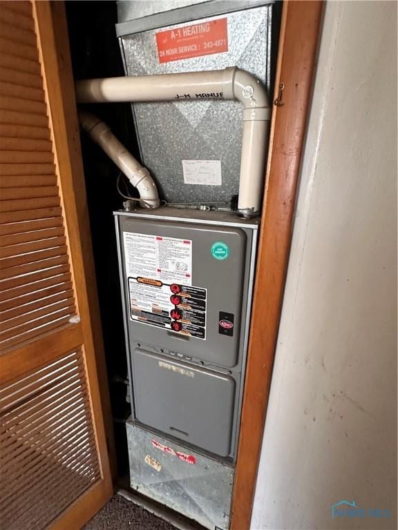41 Dickens Dr, Toledo, OH 43607 - utility room with heating unit
