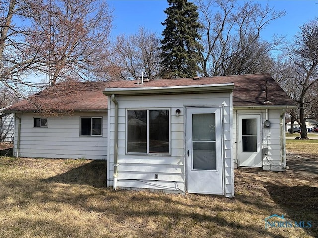 41 Dickens Dr, Toledo, OH 43607 - back of house featuring a yard