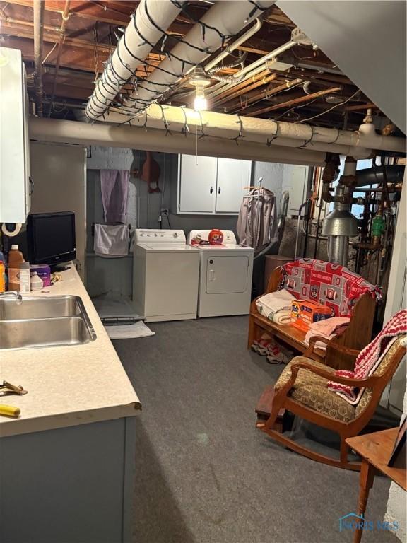 421 Farnsworth Rd, Waterville, OH 43566 - unfinished basement featuring washer and dryer, a sink, and dark carpet