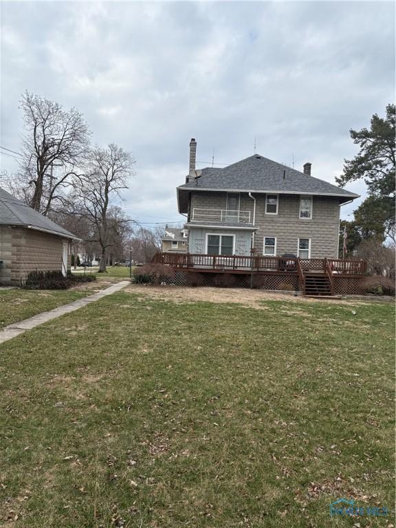 421 Farnsworth Rd, Waterville, OH 43566 - back of property with a chimney, a deck, a yard, and a shingled roof