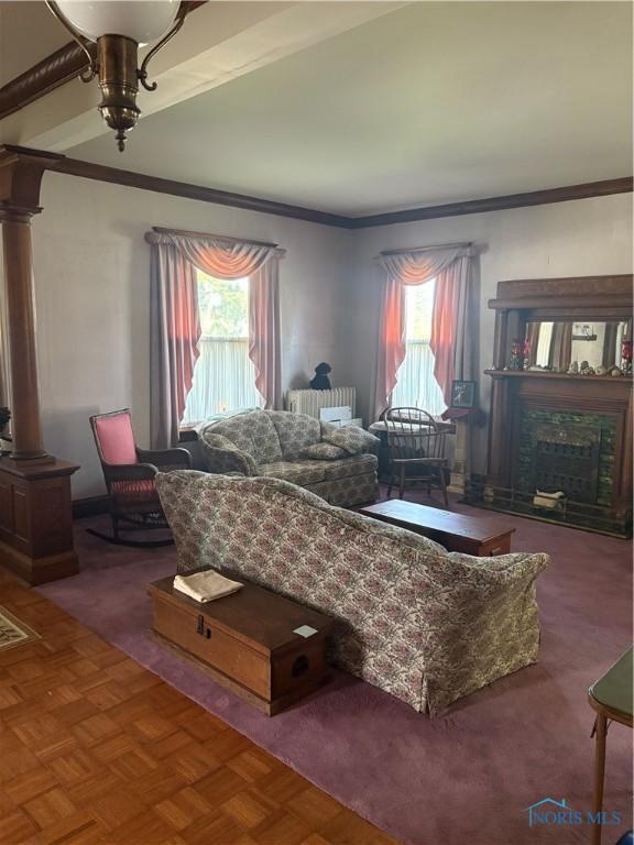 421 Farnsworth Rd, Waterville, OH 43566 - living room featuring ornate columns, healthy amount of natural light, ornamental molding, and a fireplace