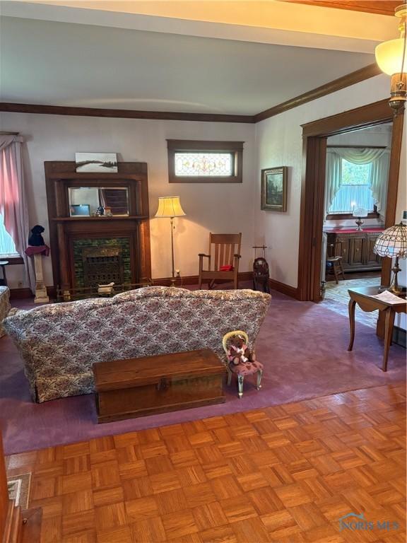 421 Farnsworth Rd, Waterville, OH 43566 - living area with crown molding and a fireplace