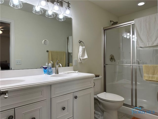 9277 Colonel Dr, Findlay, OH 45840 - full bath featuring tile patterned flooring, toilet, a shower stall, a sink, and double vanity