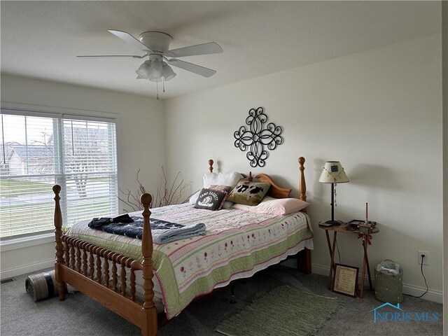 9277 Colonel Dr, Findlay, OH 45840 - carpeted bedroom featuring baseboards and ceiling fan
