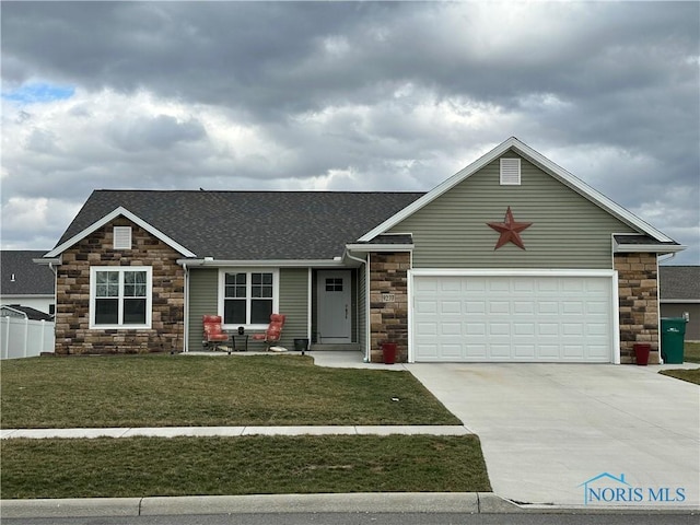 9277 Colonel Dr, Findlay, OH 45840 - view of front of home featuring a front lawn, a shingled roof, stone siding, and concrete driveway