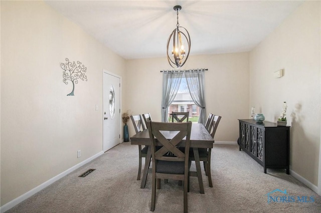400 W St, Archbold, OH 43502 - dining area featuring baseboards, carpet floors, visible vents, and an inviting chandelier