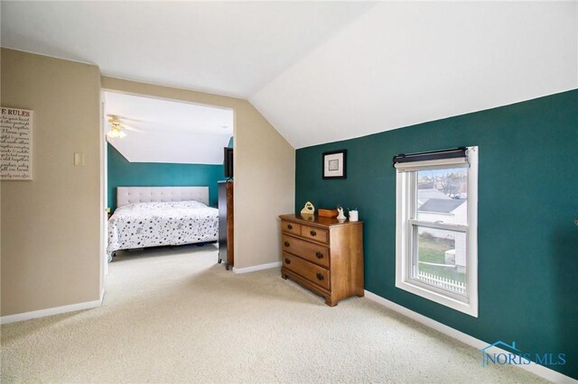 400 W St, Archbold, OH 43502 - bedroom featuring vaulted ceiling, baseboards, and carpet