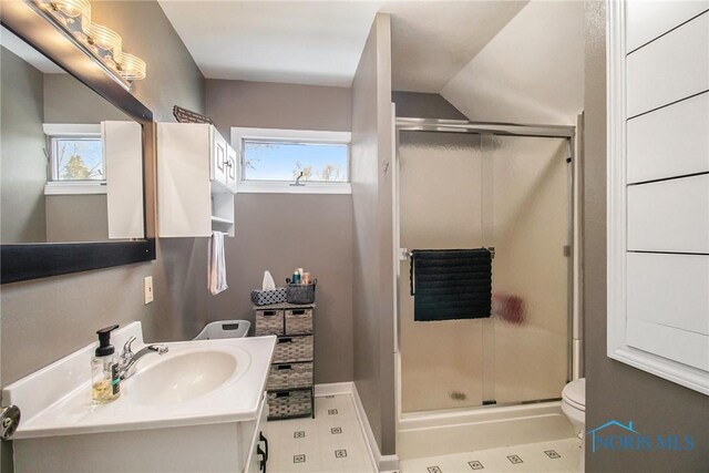 400 W St, Archbold, OH 43502 - bathroom featuring a shower stall, toilet, and vanity