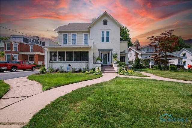 634 Holgate Ave, Defiance, OH 43512 - traditional-style house featuring a front yard