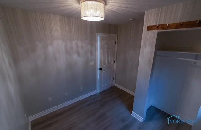 3844 Washburn Rd, Berkey, OH 43504 - unfurnished dining area featuring wood finished floors and baseboards