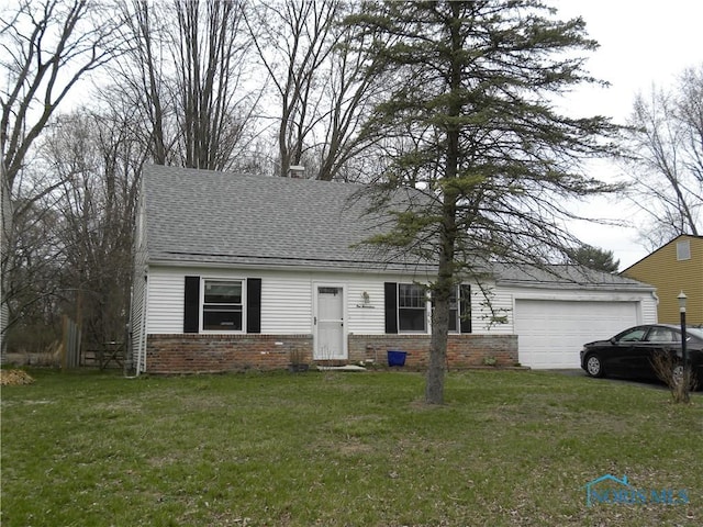 117 Marshall Dr, Swanton, OH 43558 - view of front of home featuring brick siding, a shingled roof, a front lawn, and an attached garage