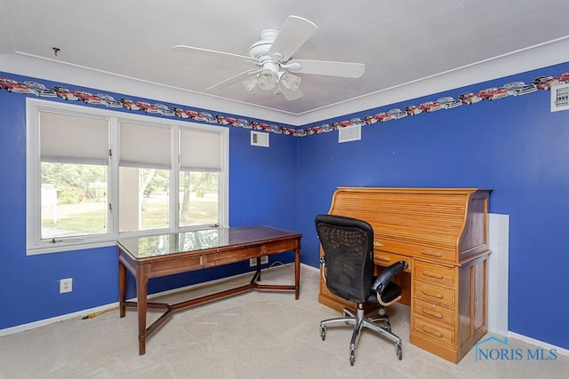 home office featuring baseboards, carpet floors, and visible vents