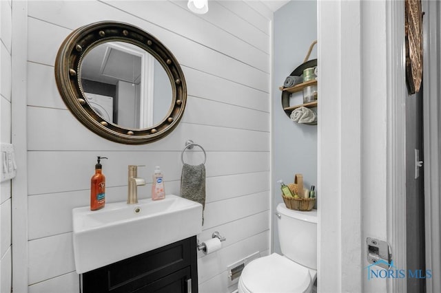 half bath with toilet and vanity