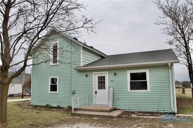 314 Caldwell St, Bradner, OH 43406 - back of property with a shingled roof