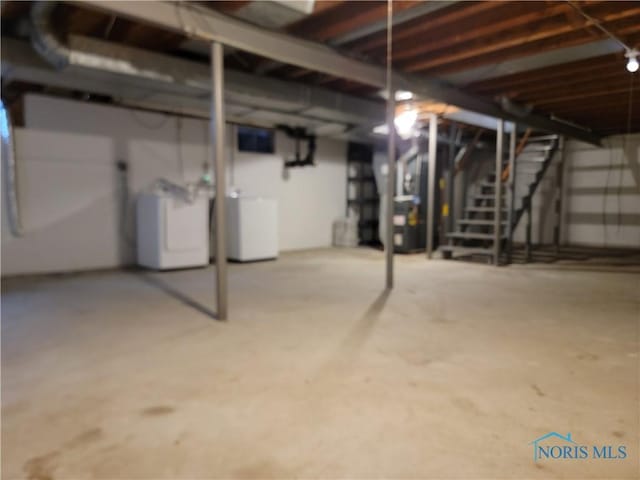 354 N River Rd, Waterville, OH 43566 - unfinished below grade area featuring washer / clothes dryer and stairway