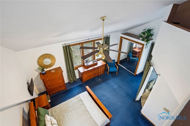 interior space with lofted ceiling and carpet flooring