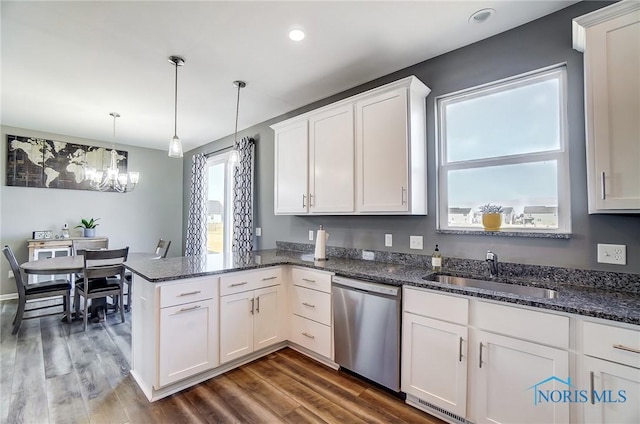 100 Bentley Dr, Perrysburg, OH 43551 - kitchen featuring white cabinets, a sink, a peninsula, and dishwasher
