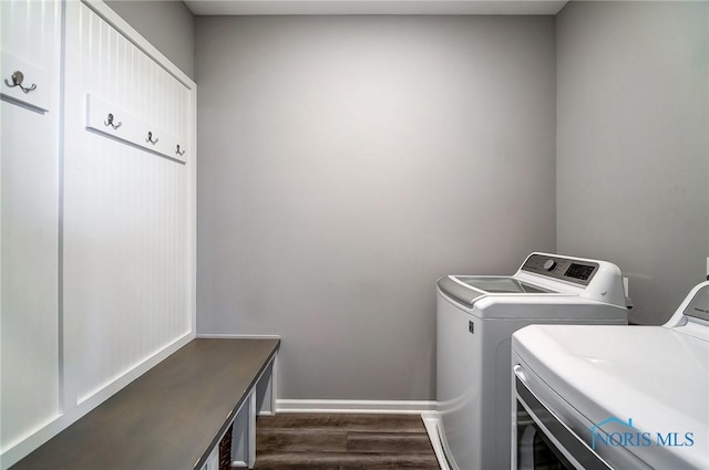 100 Bentley Dr, Perrysburg, OH 43551 - laundry area featuring baseboards, laundry area, washer and clothes dryer, and dark wood finished floors