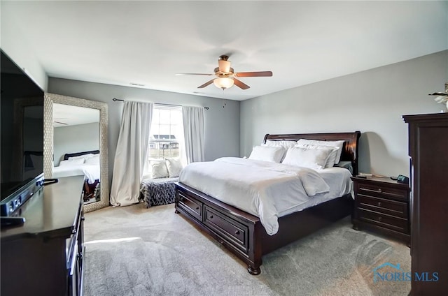 100 Bentley Dr, Perrysburg, OH 43551 - bedroom featuring a ceiling fan and light carpet