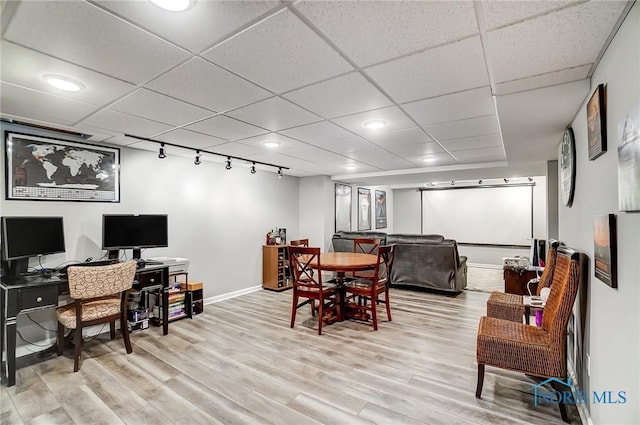 100 Bentley Dr, Perrysburg, OH 43551 - dining area featuring baseboards, light wood-style flooring, and a paneled ceiling