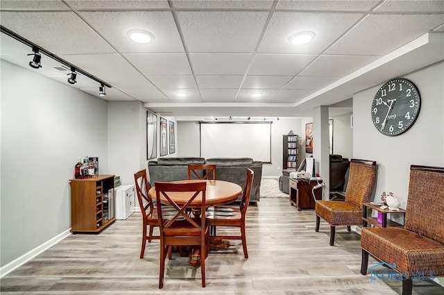 100 Bentley Dr, Perrysburg, OH 43551 - dining area featuring light wood-type flooring, rail lighting, baseboards, recessed lighting, and a paneled ceiling