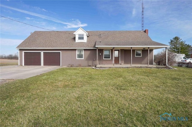 16325 Road 25P, Ottoville, OH 45844 - view of front facade featuring a garage, covered porch, concrete driveway, a front yard, and roof with shingles