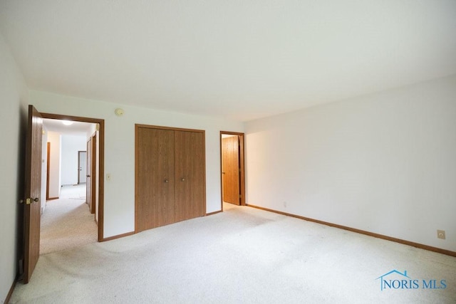 5644 Greenridge Dr Unit 5644, Toledo, OH 43615 - unfurnished bedroom with light colored carpet and a closet