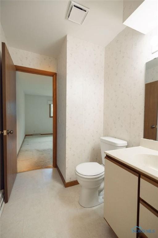 5644 Greenridge Dr Unit 5644, Toledo, OH 43615 - half bath with wallpapered walls, vanity, and tile patterned floors