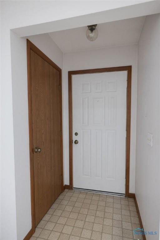 5644 Greenridge Dr Unit 5644, Toledo, OH 43615 - doorway to outside with baseboards and light flooring