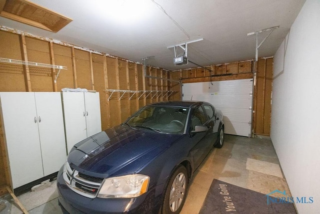 5644 Greenridge Dr Unit 5644, Toledo, OH 43615 - garage with a garage door opener