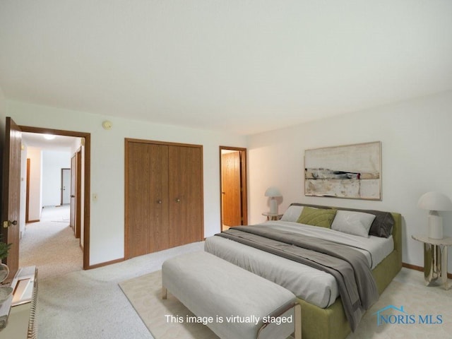 5644 Greenridge Dr Unit 5644, Toledo, OH 43615 - bedroom with light colored carpet and a closet