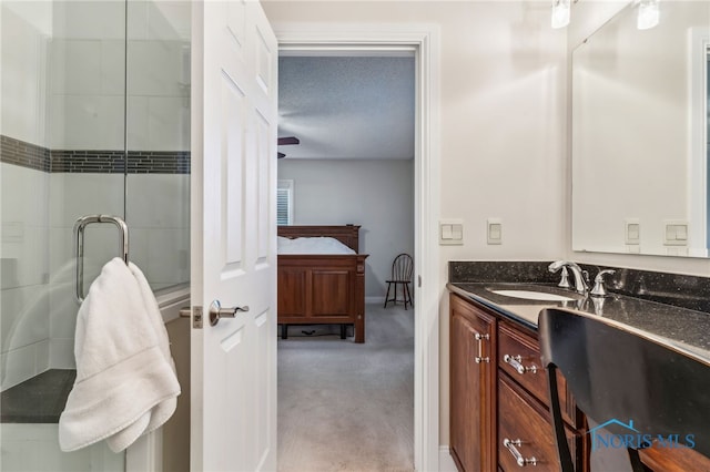 3114 Gleneagle Dr, Findlay, OH 45840 - ensuite bathroom with vanity, baseboards, an enclosed shower, and ensuite bath