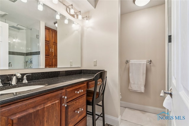 3114 Gleneagle Dr, Findlay, OH 45840 - bathroom with vanity, tile patterned flooring, toilet, baseboards, and a shower stall