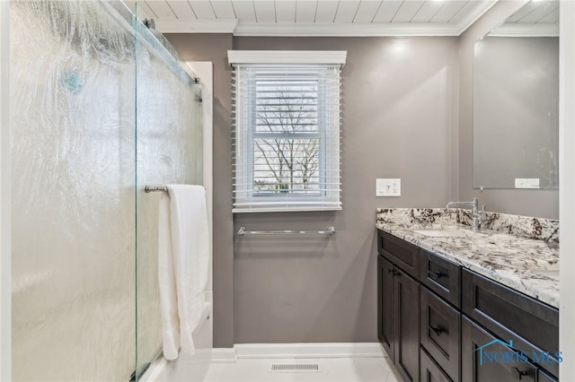 3114 Gleneagle Dr, Findlay, OH 45840 - bathroom featuring crown molding, vanity, a stall shower, and visible vents