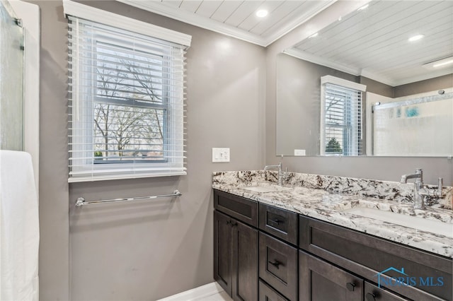 3114 Gleneagle Dr, Findlay, OH 45840 - bathroom with double vanity, recessed lighting, baseboards, and a sink