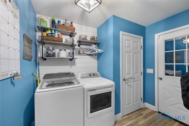 1823 Lexington Dr, Perrysburg, OH 43551 - washroom with baseboards, wood finished floors, laundry area, and washer and dryer
