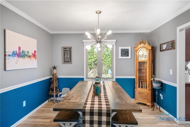 1823 Lexington Dr, Perrysburg, OH 43551 - dining room with ornamental molding, a chandelier, and wood finished floors