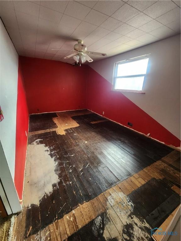 825 Park St, Findlay, OH 45840 - empty room with hardwood / wood-style floors and a ceiling fan