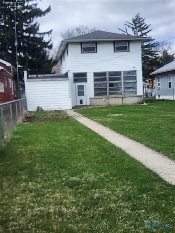 825 Park St, Findlay, OH 45840 - back of property featuring fence and a yard