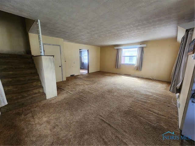 825 Park St, Findlay, OH 45840 - interior space with carpet floors, a textured ceiling, and stairway