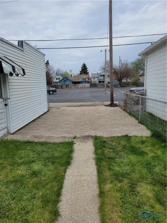 621 Nevada St, Toledo, OH 43605 - view of yard with a residential view and fence