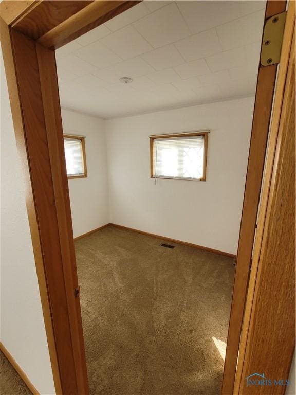 621 Nevada St, Toledo, OH 43605 - carpeted spare room featuring baseboards and visible vents