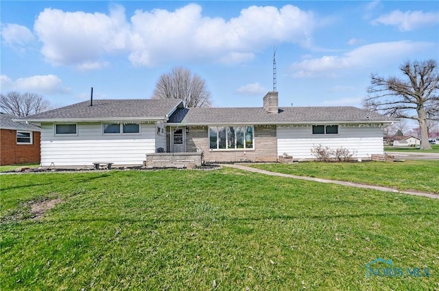 284 E Findlay St, Sugar Creek Township, OH 45893 - ranch-style house featuring a front yard, roof with shingles, and a chimney